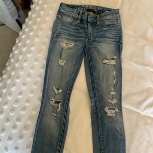 Ripped acid wash jeans